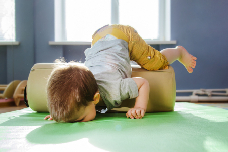 Small child needing to re-establish stability after falling. Credit: https://www.istockphoto.com/portfolio/johnalexandr