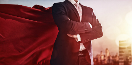 Leader in business suit with a super-hero cape