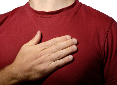 A man holding hand over heart. Credit: https://www.istockphoto.com/au/portfolio/roberthyrons