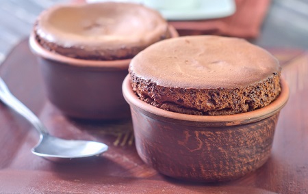 Two small brown pots of chocolate soufflé. Credit: https://www.istockphoto.com/portfolio/tycoon751